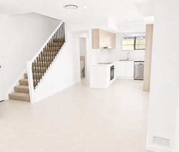 GREAT LOCATION-SPACIOUS 3 BED 2 BATH FULLY DUCTED AIRCON - Photo 6