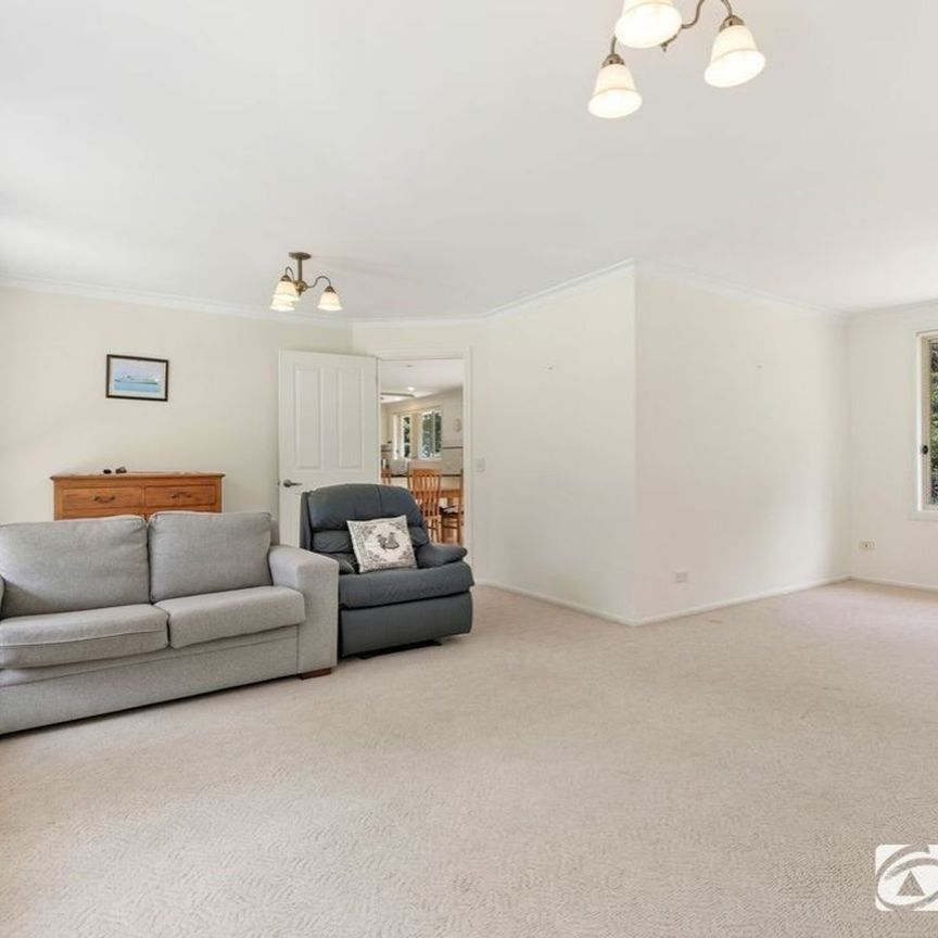 Enjoy peaceful living in a spacious family home - Photo 1