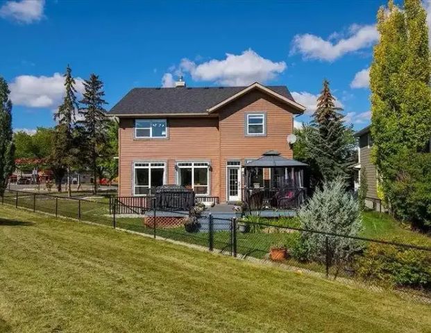 Stunning 2 Bedroom Home with Lots of Greenspace! | 12 Hidden Creek Drive Northwest, Calgary - Photo 1