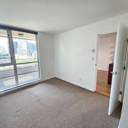 1 Bedroom + Den + 1 Parking- Well-Located - Photo 1