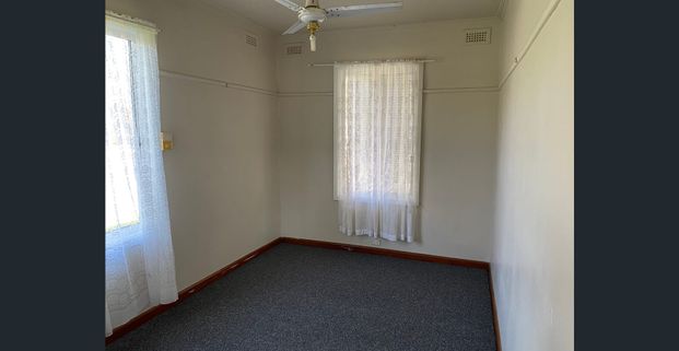 Simple Living with a Spacious Yard - Photo 1