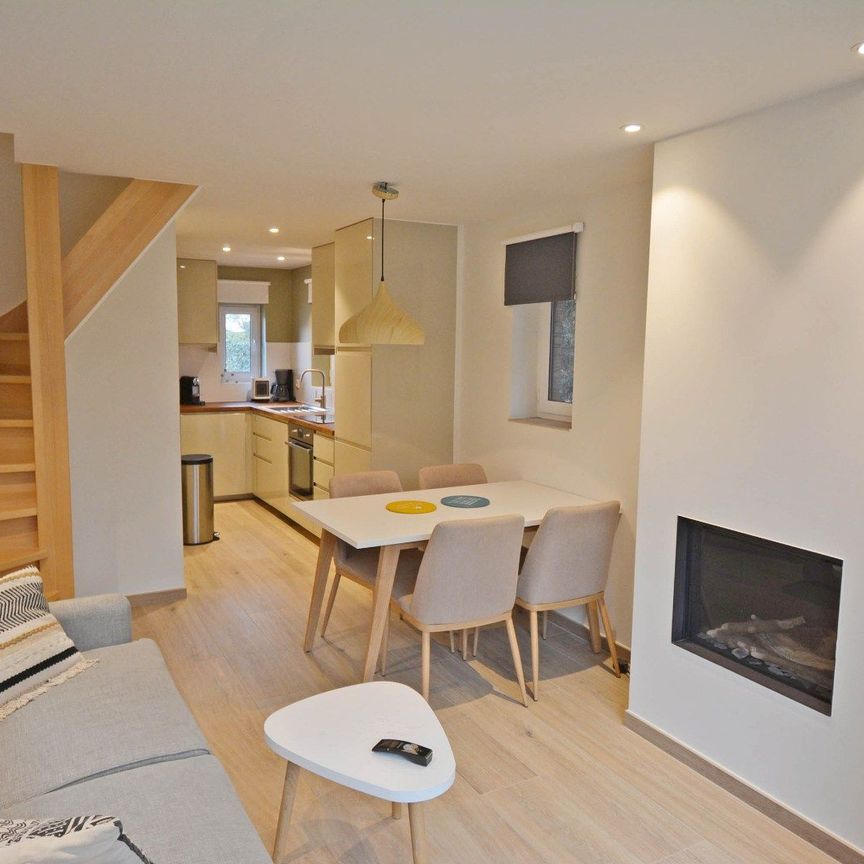 Charmante woning met tuin, terras en 2 slaapkamers. - Photo 1