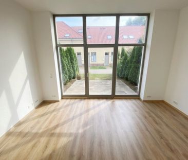 Wohnen mit Reihenhauscharakter! Schickes 1- Zimmerappartment+Stellp... - Photo 3