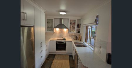 Four bedrooms home with secure parking | Available 2/12/25 - Photo 2