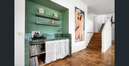 Furnished Coastal Oasis with Panoramic Views and Artistic Flair - Photo 3