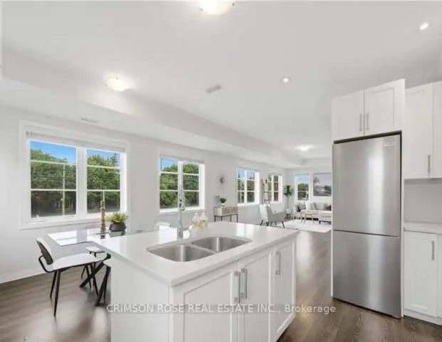 10 - 70 PLAINS ROAD W — 2 Bedroom - Photo 1