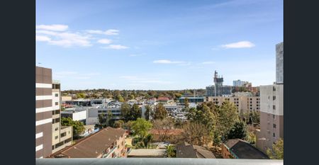 Stylish Two-Bedroom Apartment with City Views in the Heart of Parramatta - Photo 4