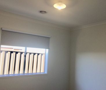 Modern 4-Bedroom Family Home in Highly Desirable Mt Atkinson Estate - Photo 6