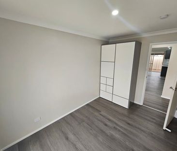 NEAT & TIDY FOUR BEDROOM HOME! - Photo 3