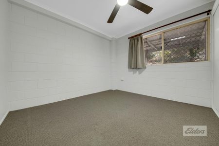 THIS PROPERTY OFFERS LOW MAINTENANCE LIVING WITH A SPACIOUS YARD , PRACTICAL LAYOUT AND SOLAR! - Photo 4