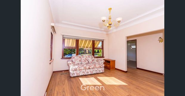 Charming Three-Bedroom Full-Brick Home in Sought-After Location! - Photo 1