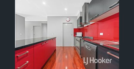 SPACIOUS DOUBLE-STOREY FAMILY HOME IN THE HEART OF CRANBOURNE EAST! - Photo 2