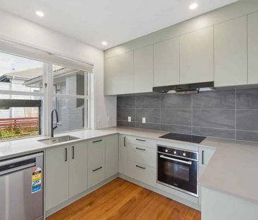 Freshly Renovated & Private – Modern Two-Level Townhouse Living - Photo 2