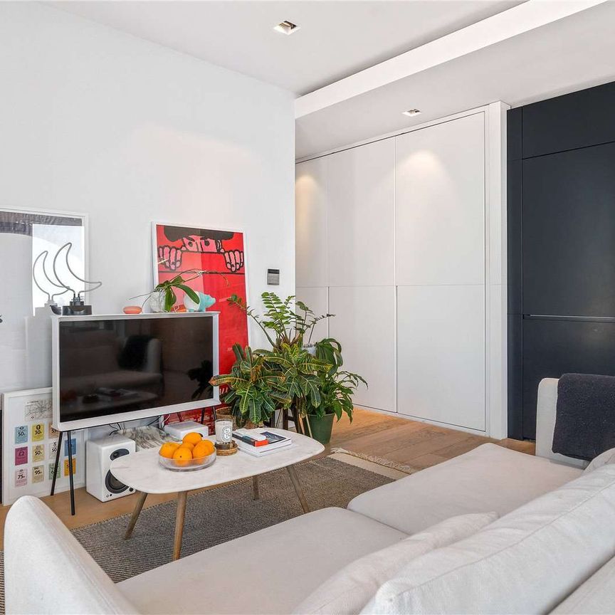 A top floor two bedroom apartment with stunning views in the Barts Square development. - Photo 1