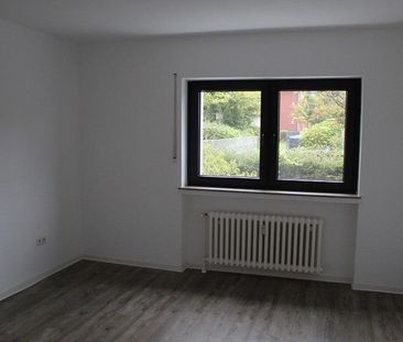 Schicke Erdgeschosswohnung mit Terrasse und Gartenanteil! - Photo 6