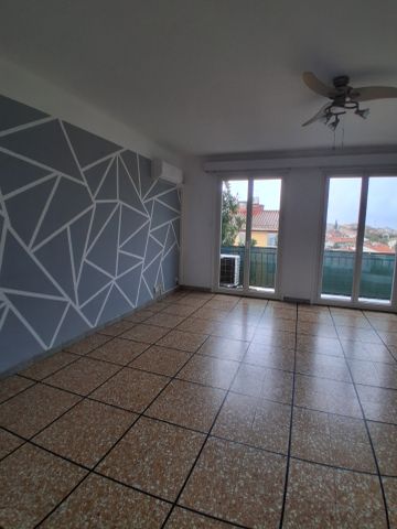 T4 traversant avec climatisation, balcon, cave et garage - Photo 2
