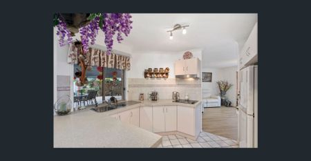 Nestled in one of Carrara's peaceful and family-friendly street, this delightful home is now available for rent. - Photo 2