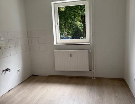 Schicke EG-Wohnung im modernisierten 4-FMH! - Foto 1