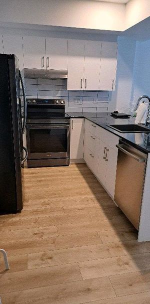 CONDO HAUTE GAMME 41/2 (CESSATION BAIL) - Photo 1