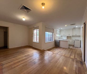 Charming Three-Bedroom Home with Spacious Living and Outdoor Entert... - Photo 4