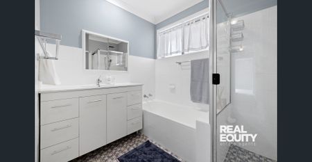 Family Residence with a Fresh Interior - Photo 3