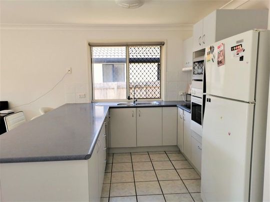 Spacious timber and tile floor. - Photo 1