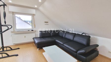 Gemütliche Dachgeschosswohnung mit Einbauküche - Foto 5