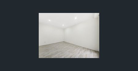 ****Renovated 2 Bedroom Apartment**** NOTE: the mural of the beach is actually affixed to the back wall of the property and not photo shopped - Photo 5