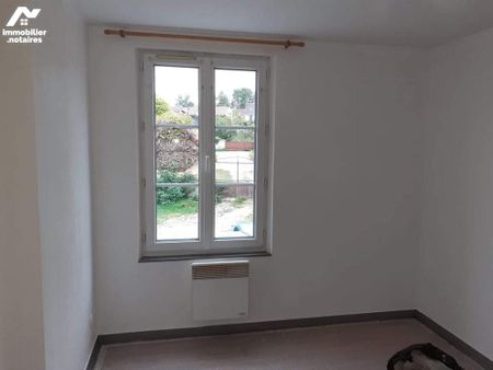 Un appartement au 1er étage dans le centre du bourg - Photo 5