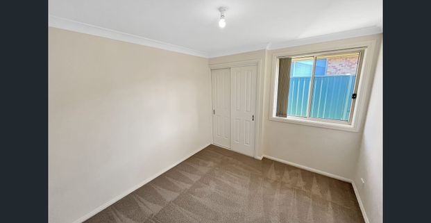 Spacious & Stylish 4-Bedroom Family Home - Photo 1