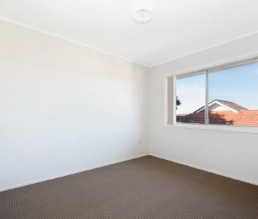 Well-Located Two-Bedroom Apartment with Carport - Photo 2
