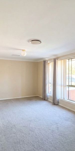 Spacious Family Home in a Prime Glenmore Park Location - Photo 1