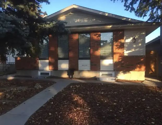 Renovated 3 Bedroom Main Floor of Bungalow w. Double Heated Garage | 51 Woodglen Close Southwest, Calgary - Photo 1