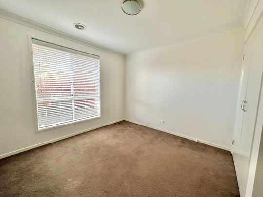 Modern Four Bedroom Home in a Desirable Location! - Photo 1