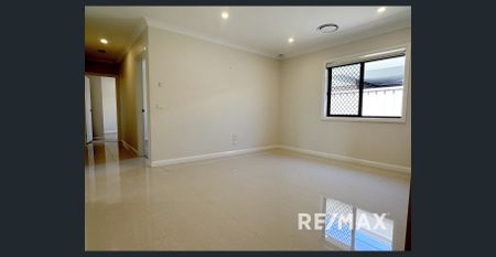 Large Family Home In Lloyd - Photo 3