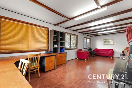 Charming 1950s Home with Modern Flexibility & Pristine Gardens! - Photo 4