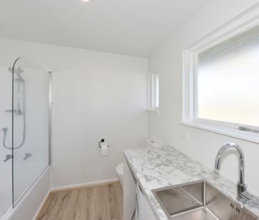 Spacious Family Living with Bonus Sleepout in Woolston - Photo 4