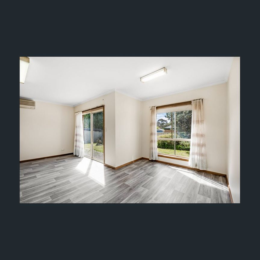 Charming Courtyard Home with Tranquil Setting! - Photo 1