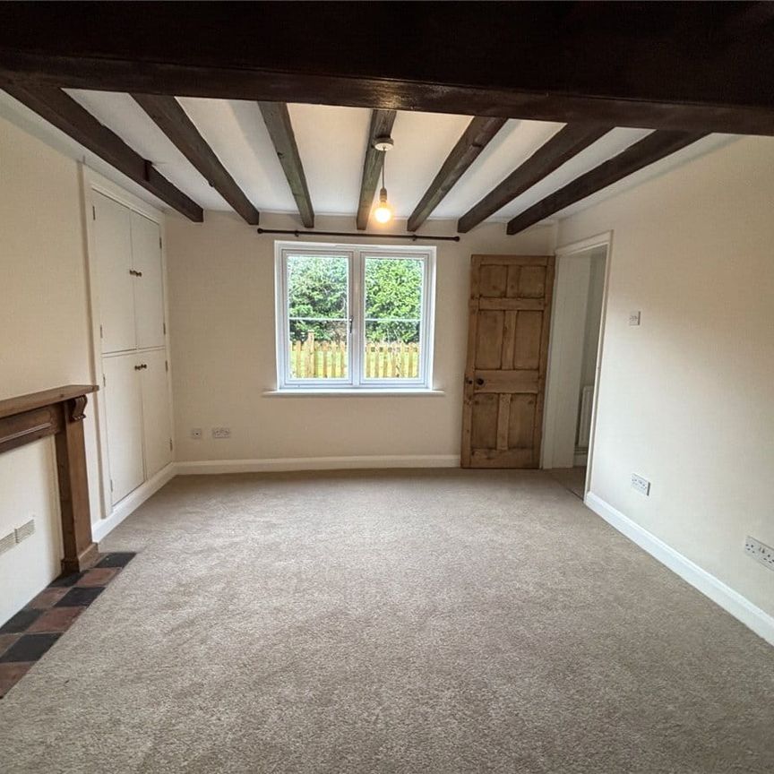 A 2 bedroom terraced cottage with a double garage and off-street parking in Willesley. - Photo 1