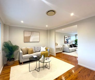 Location! Location! Elegant Family Living with Multiple Living Zone... - Photo 1