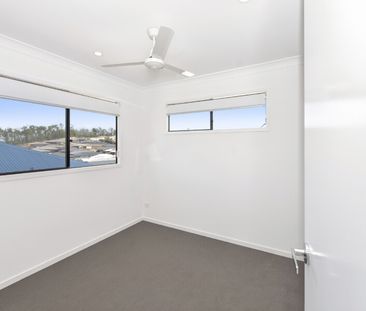 Two-Storey Home with Several Living Spaces and Air-Conditioning - Photo 1