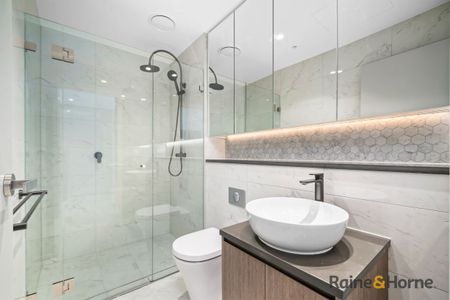 Near-New Luxury 2 Bedroom Apartment in the Heart of Rhodes Central - Photo 4