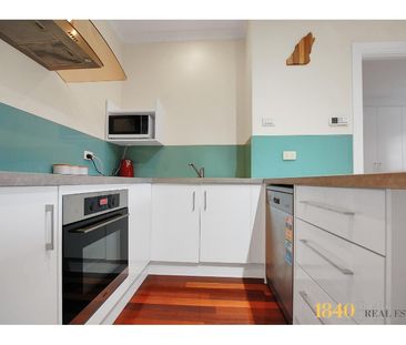 Spacious Unit in a Prime Location! - Photo 3