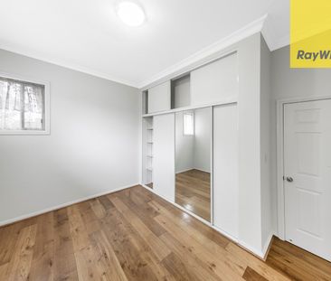 FRESHLY UPDATED FOUR BEDROOM FAMILY HOME IN TREE-LINED STREET OF WE... - Photo 3