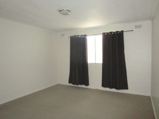 Spacious Ground Level Two Bedroom Unit - Photo 1