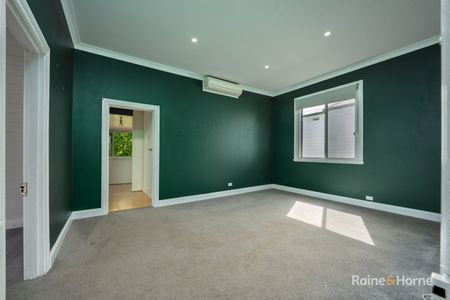Well-Appointed Home with a Large Flat Backyard in a Central Location - Photo 3