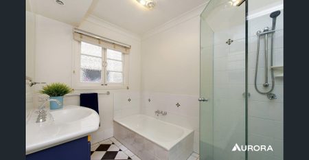 Stunning Elevated Queenslander with City Views & Exceptional Family Living - Photo 2