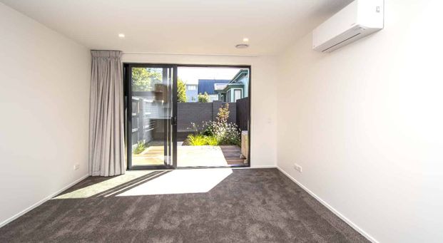 Stylish Gated Townhouse in a Prime City-Fringe Location - Photo 1