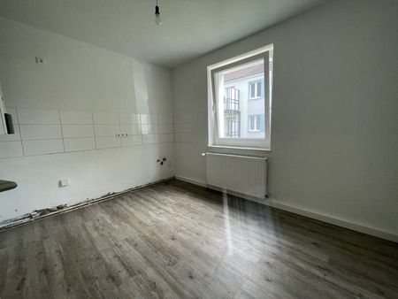 Frisch renovierte Erdgeschosswohnung in energetisch saniertem Haus frei! - Foto 4