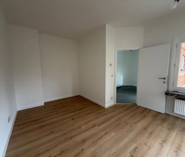 Gelijkvloersappartement met één slpk en garage - Photo 3